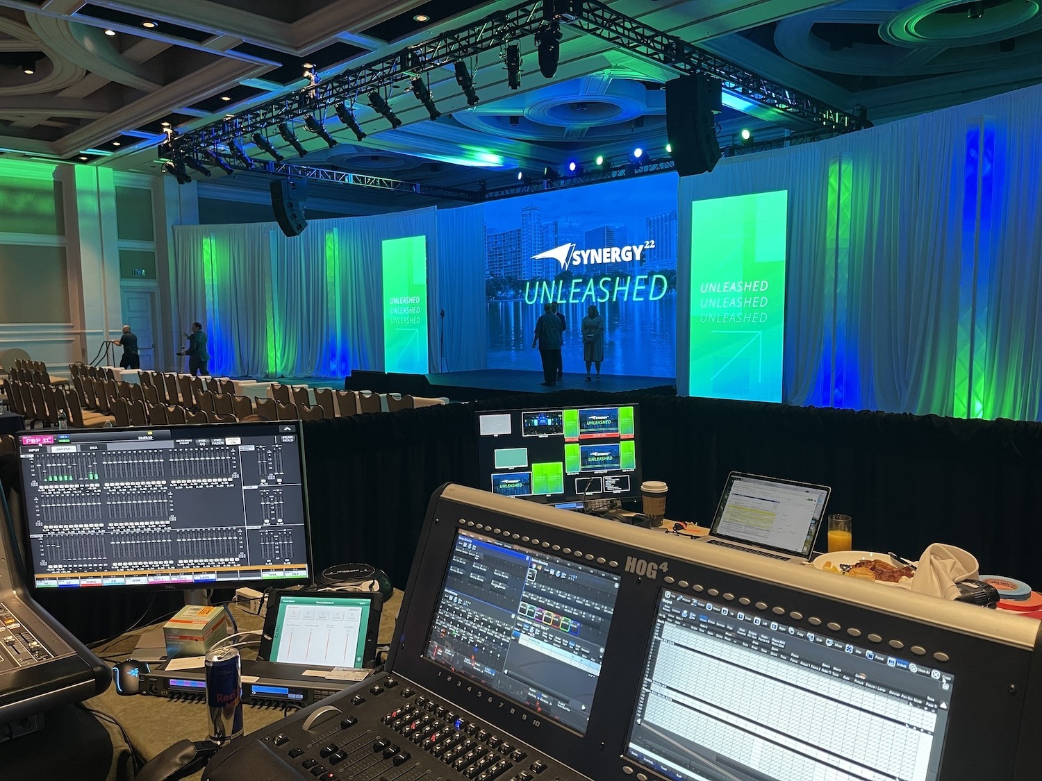 an indoor stage with lights and speakers
