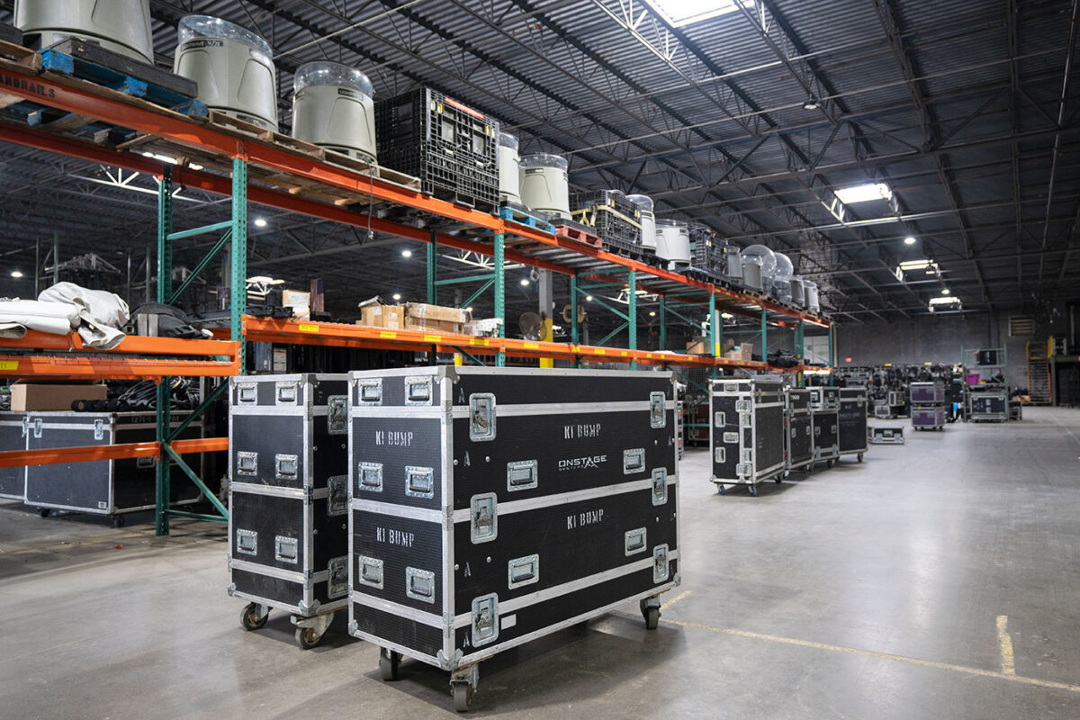 a warehouse full of cases and audio equipment
